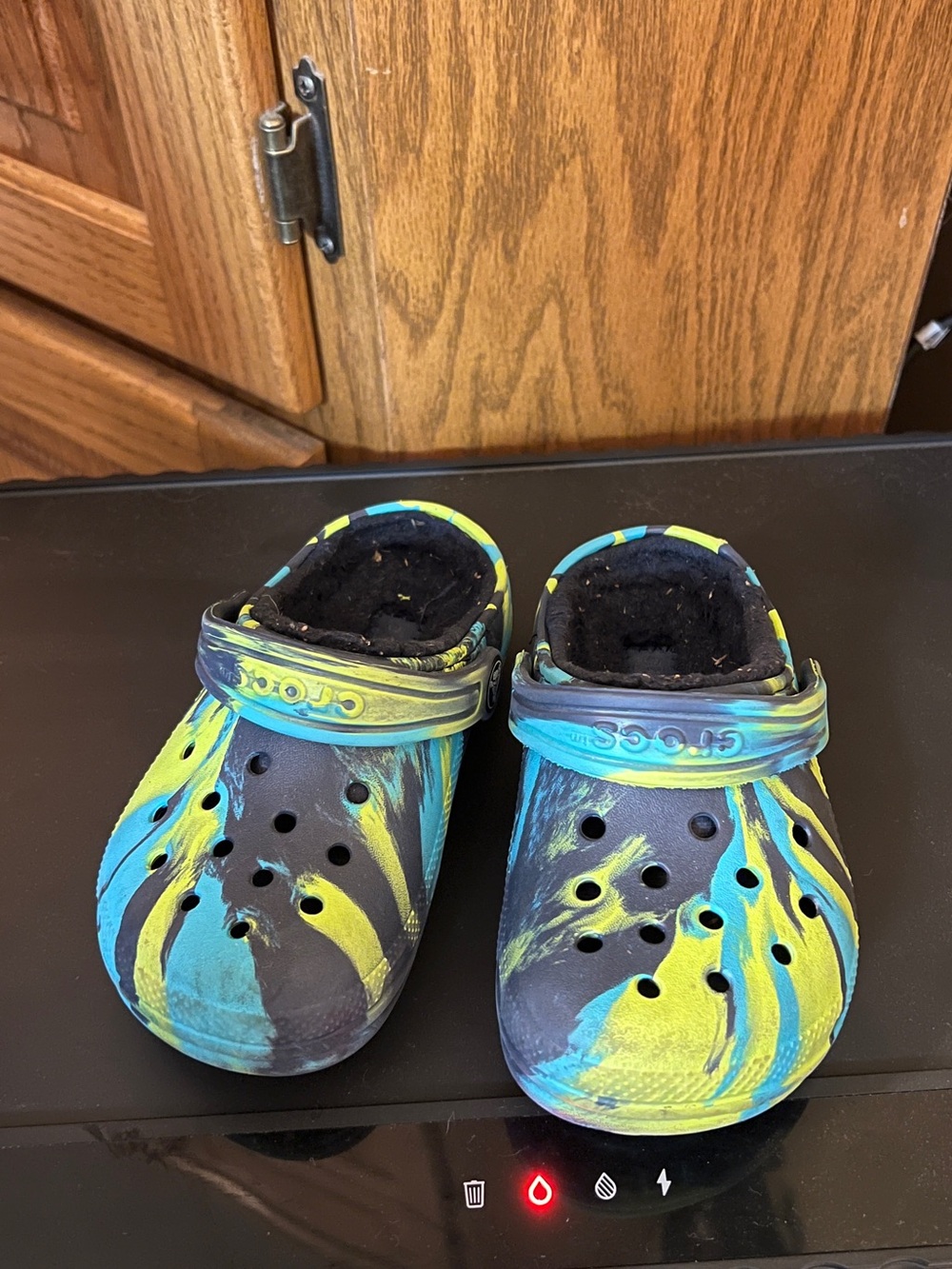 CROCS Kids Swirl Clogs in Blue and Yellow